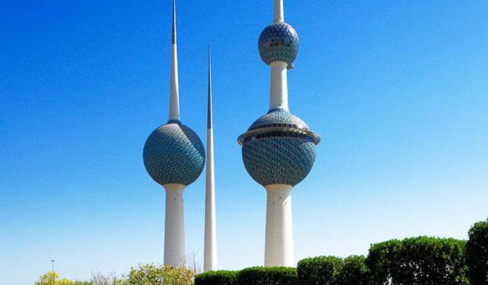 Kuwait structures in front of blue sky